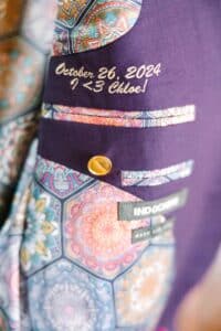 Indochino Suit with their embroidered text of their wedding date and wifes name 