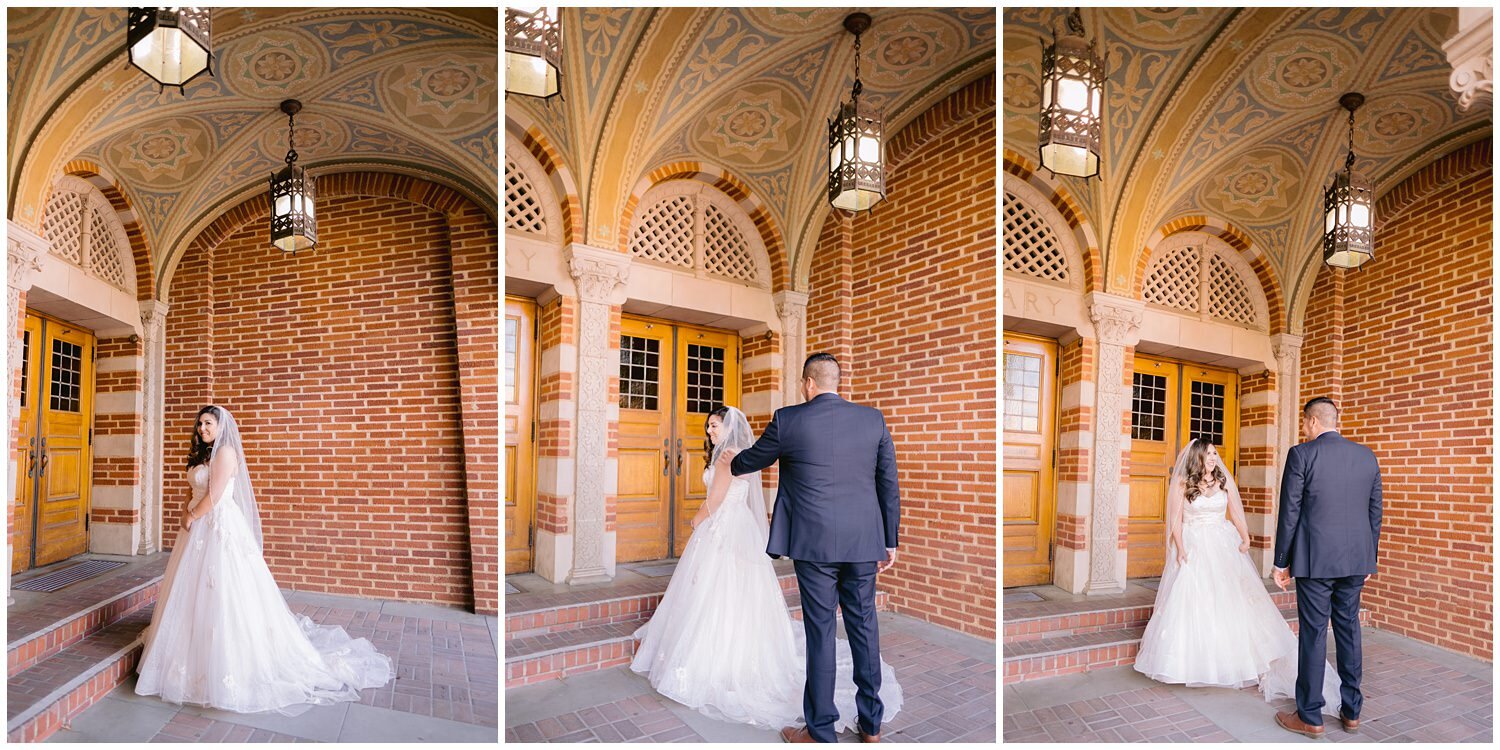 Bride and groom in front of brick building